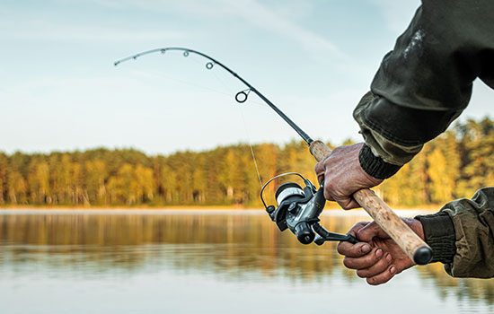 man holding a fishing rod